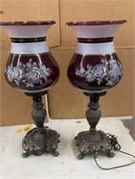 Pair of ornate decorative lamps with art glass
