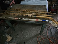 Bamboo fishing rods and hockey sticks