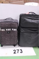 Pair of Suit Cases 1 is Lands End & 1 is Pink