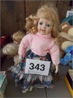 Four porcelain dolls: 16" blonde hair girl in