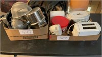 Strainers, bake pans, pots, mixer, toaster, can