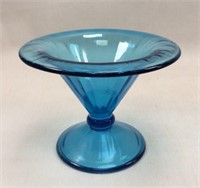 Blue 6" wide footed bowl.
