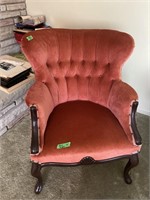 Wood and upholstered armchair