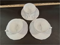 Four Cups and One Saucer