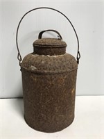 Old unique metal can with loop handle
