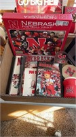 Box of husker collectibles books 2 Cousy cups