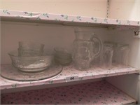 Shelf of Clear Glass Items