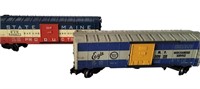 TWO LIONEL BOXCARS