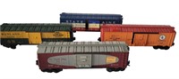 FOUR LIONEL BOXCARS