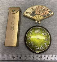 Vintage compacts and brass chewing gum holder