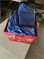 Tote of tarps and plastic