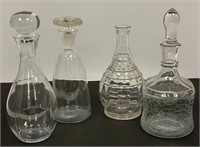 Four Glass Decanters