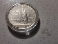1986 Ellis Island dollar coin