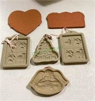 Lot consists of four cookie molds and two