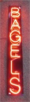 Lighted red neon bagel sign. Seller states works.