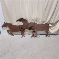 Rusty tin horse trio