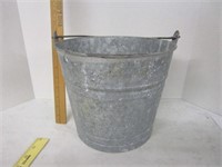 Primitive metal bucket