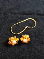 Nice peach earrings and bracelet earrings are