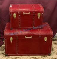 2 red faux Leather trunks