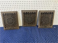 THREE CAST IRON FLOOR GRATES