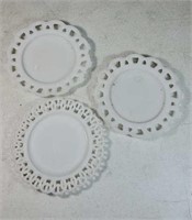 3 white ruffled edge saucers