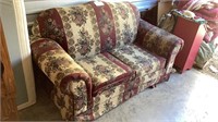 Loveseat measures approximately 40 inches deep,