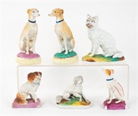 Six Bisque Porcelain Dog Figures