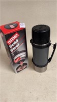 Thermos with flip and pour spout