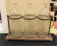 Trio of apothecary jars in stand