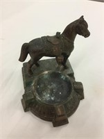 Antique metal ashtray with horse