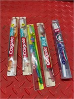 Lot of 5 new tooth brushes