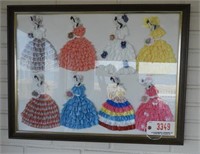 Framed collage of mini Victorian sewn dresses