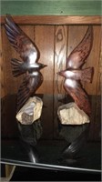 Wooden bird statues