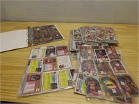 Assorted sports trading cards.