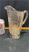 Antique pitcher/cracked
