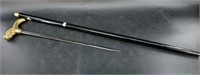Sword cane blade length is 18", overall length is