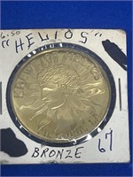 67 Helios bronze, Mardi Gras doubloon