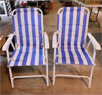 2 metal framed folding lawn chairs