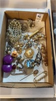 Box of various vintage jewelry