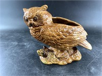 Ceramic glazed owl about 8" long with hole on top