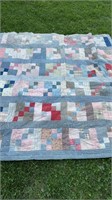 Antique quilt, damage to one corner and another
