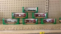 6 miniature Hess trucks