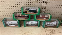 6 miniature Hess trucks