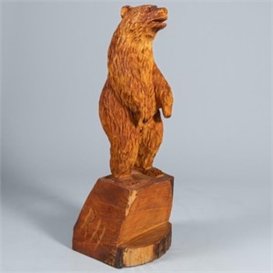 LARGE WOODEN CARVING OF A BEAR