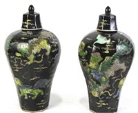 PAIR OF CHINESE FAMILLE NOIRE LIDDED JARS