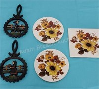 5 assorted trivets - 2 cast iron and 3 porcelain