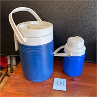 pair of Coleman water jugs coolers