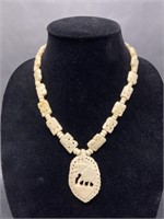 Carved Bone Elephant Necklace