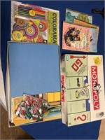 Monopoly game, golden books, an adult coloring