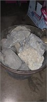 Bucket of fossils and quartz